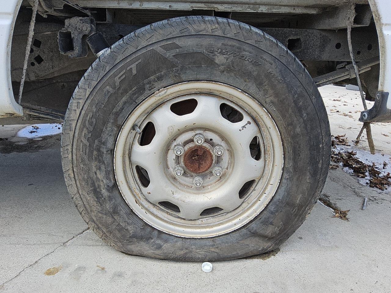 2014 Ford F150 Super Cab White vin: 1FTFX1CF6EKG22562 Damage: Left Rear Tire, Flat, Repair Required
