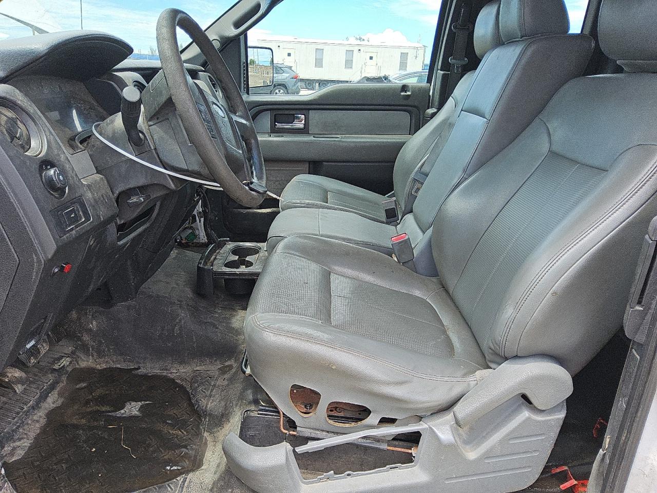 2014 Ford F150 Super Cab White vin: 1FTFX1CF6EKG22562 Damage: Left Front Seat Molding, Broken, Replacement Required