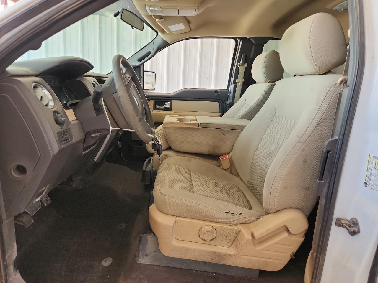 2014 Ford F150 Super Cab White vin: 1FTFX1CFXEFC51706 Damage: Left Front Seat, Torn, 1 To 2 Inches
