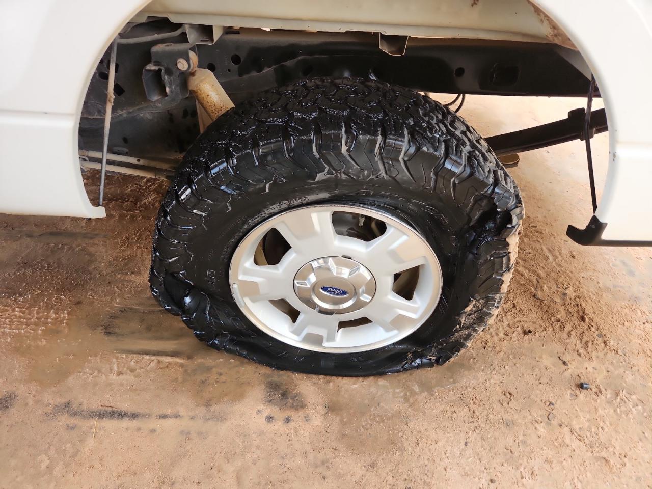 2014 Ford F150 Super Cab White vin: 1FTFX1CFXEFC51706 Damage: Left Rear Tire, Cut, Replacement Required