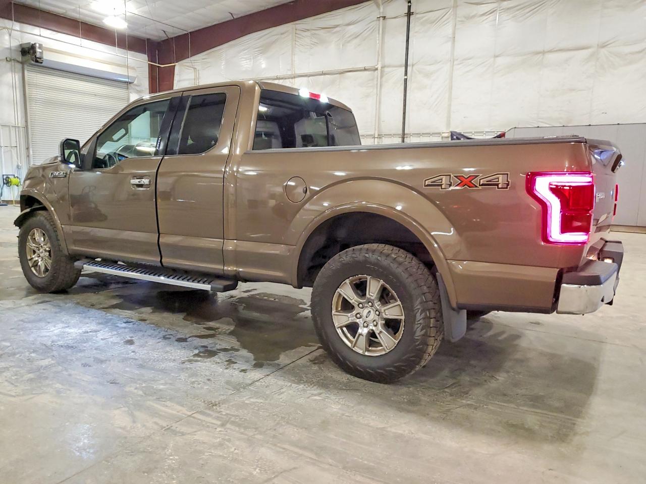 2015 Ford F150 Super Cab Коричневый vin: 1FTFX1EF1FKE50049