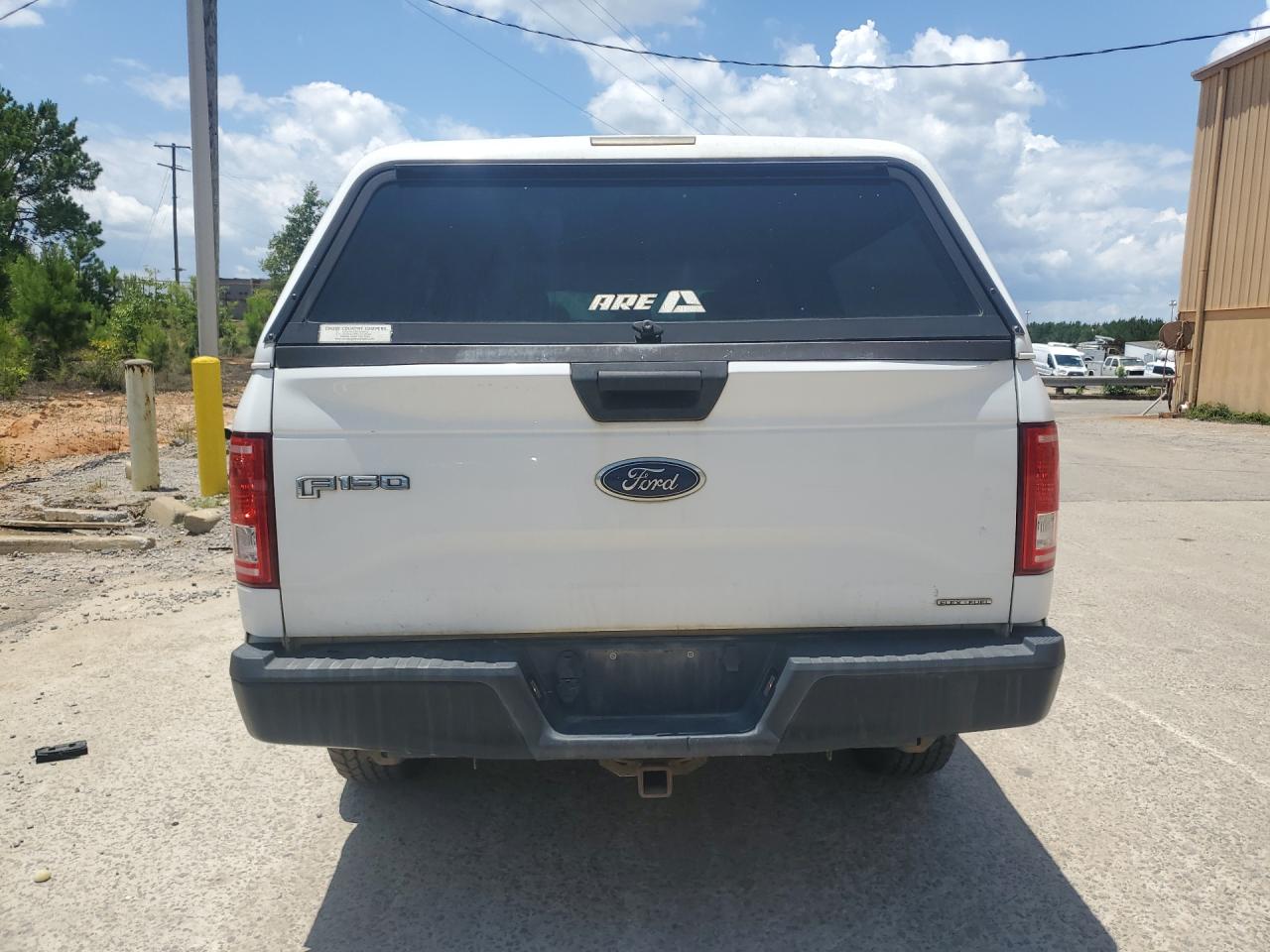 2015 Ford F150 Super Cab White vin: 1FTFX1EF3FFA61535 Damage: Tailgate, Chipped, 2