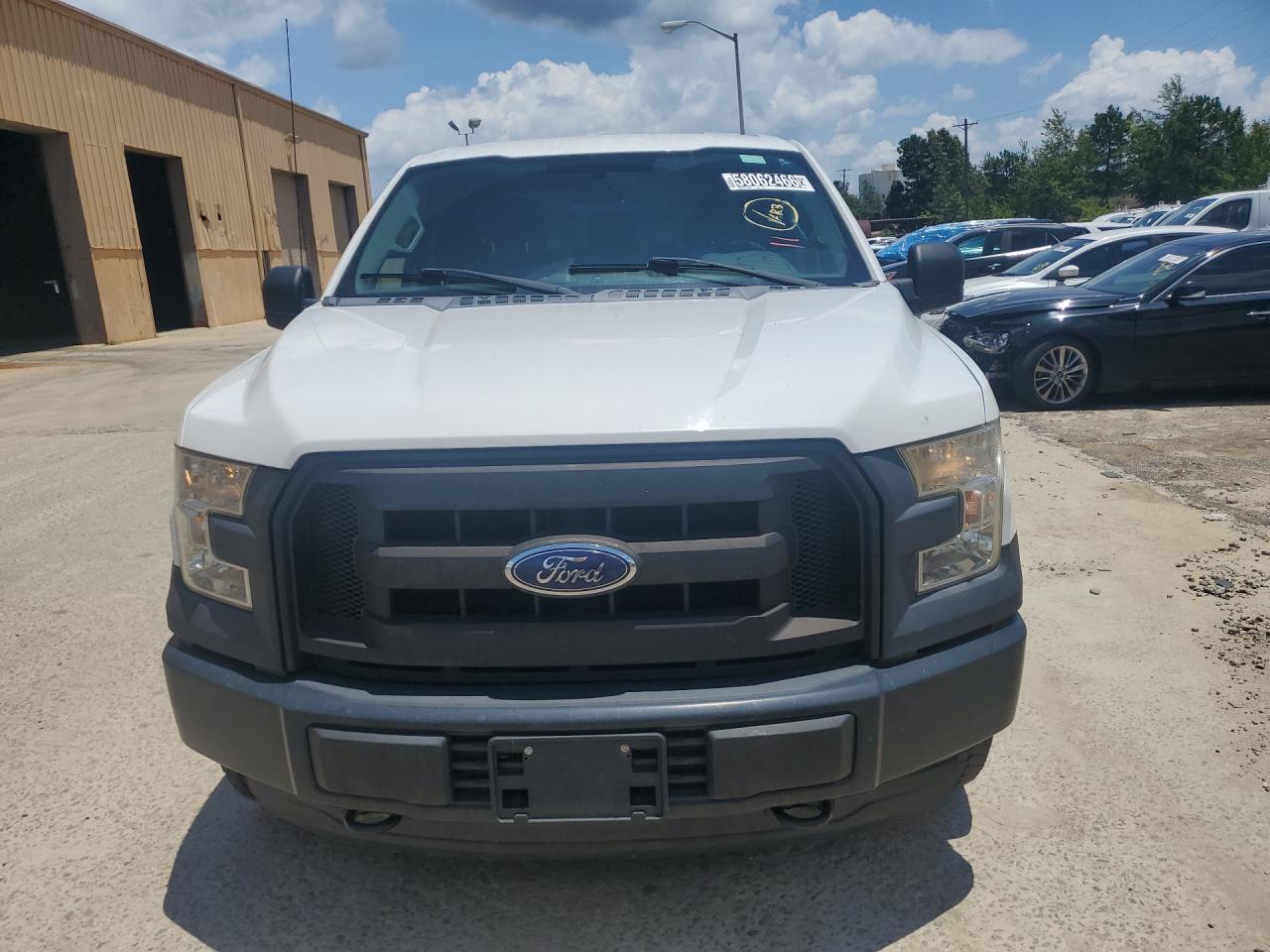 2015 Ford F150 Super Cab White vin: 1FTFX1EF3FFA61535 Damage: Left Head Lamp, Faded, Repair Required