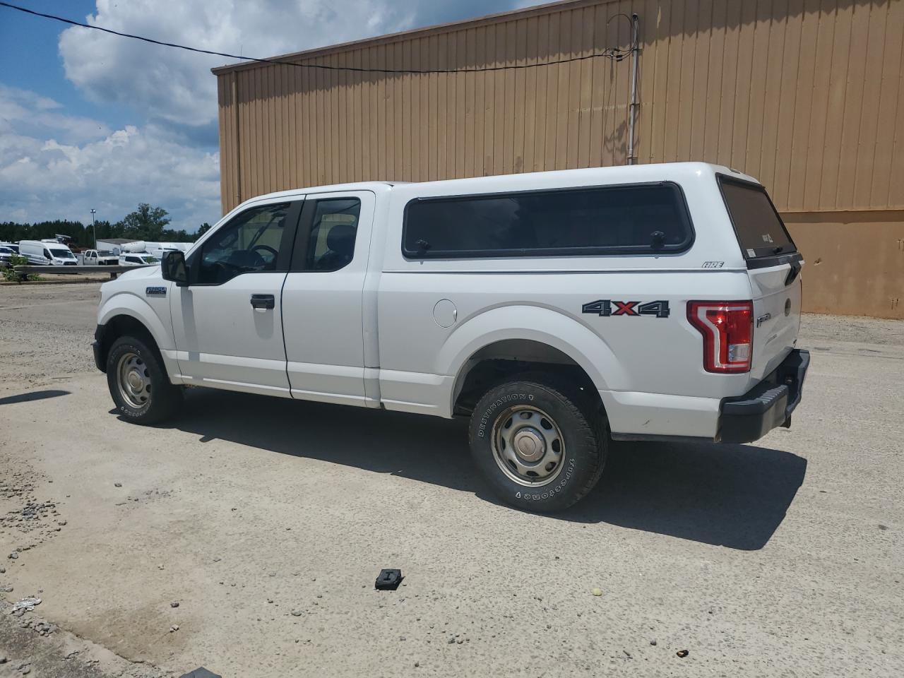 2015 Ford F150 Super Cab White vin: 1FTFX1EF3FFA61535 Damage: L Cab Corner Panel, Dent(S) W/No Paint Dmg, Pdr-1 Dent