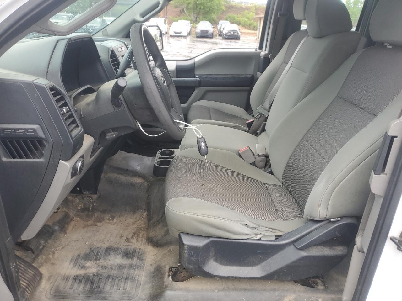 2015 Ford F150 Super Cab White vin: 1FTFX1EF3FFA61535 Damage: Steering Wheel, Worn, Replacement Required