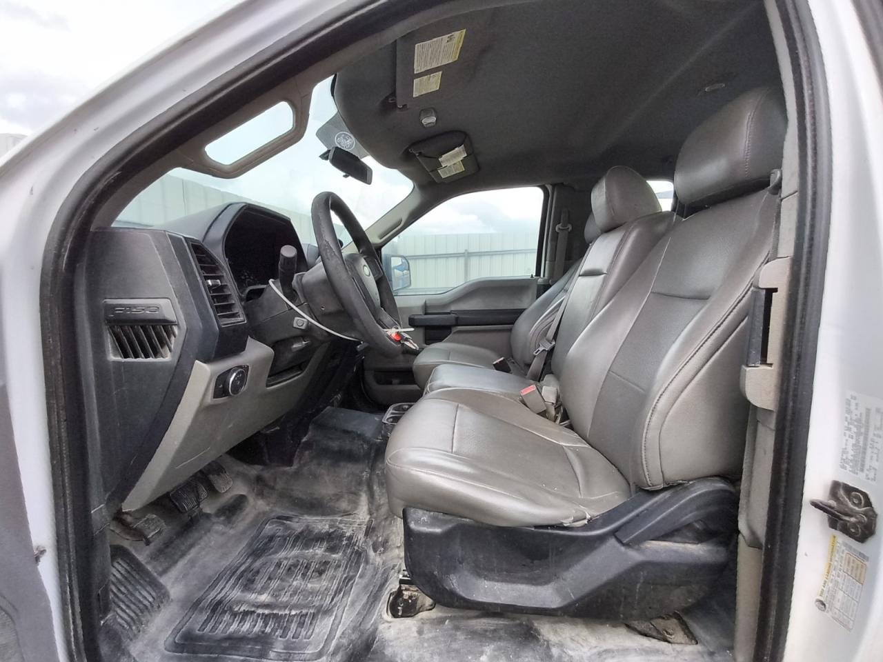 2015 Ford F150 Super Cab White vin: 1FTFX1EF4FFB00309 Damage: Left Front Seat, Torn, 1 To 2 Inches