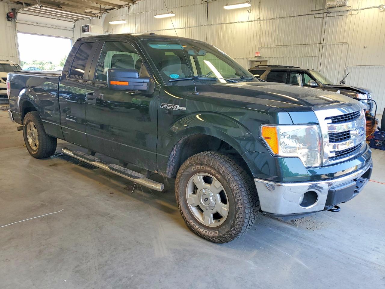 2014 Ford F150 Super Cab Зеленый vin: 1FTFX1EF5EFB13004