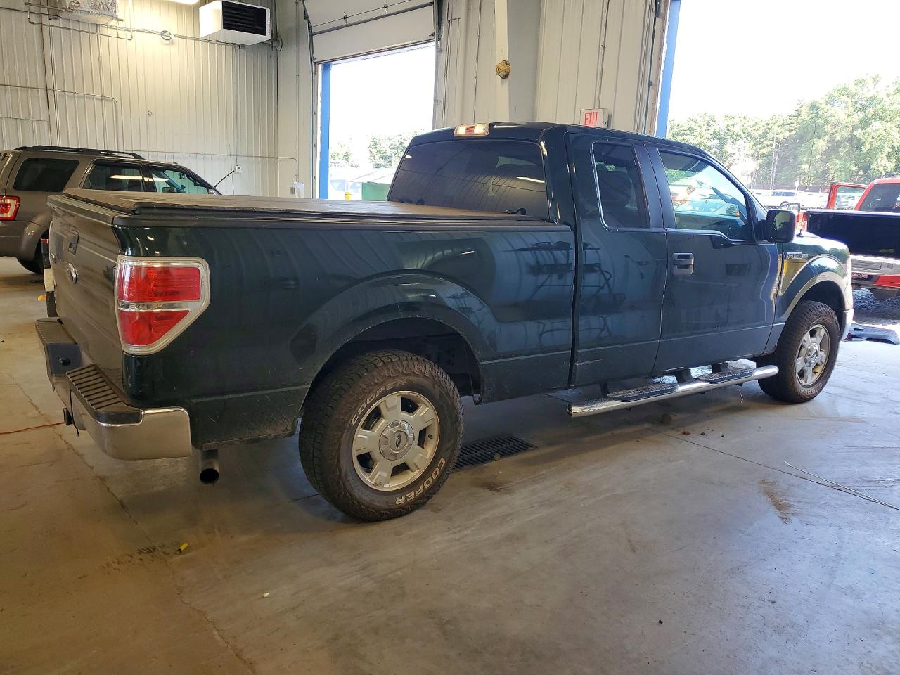 2014 Ford F150 Super Cab Зеленый vin: 1FTFX1EF5EFB13004