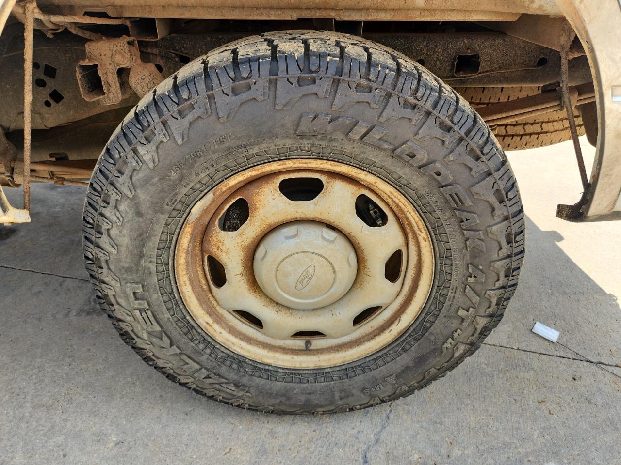2011 Ford F150 Super Cab White vin: 1FTFX1EF7BFB42774 Damage: Left Rear Wheel, Rust, Repair Required