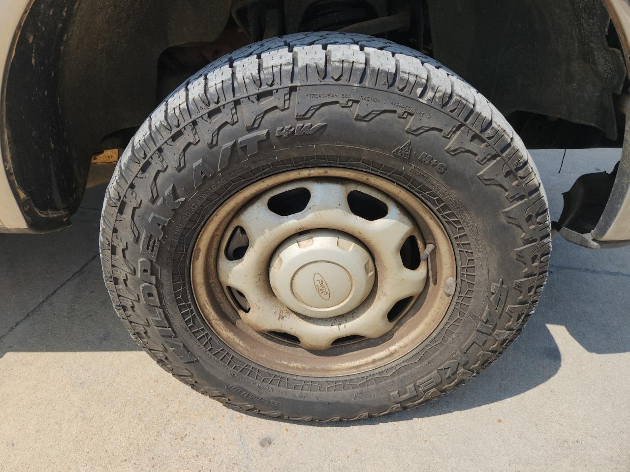2011 Ford F150 Super Cab White vin: 1FTFX1EF7BFB42774 Damage: Right Front Wheel, Rust, Repair Required