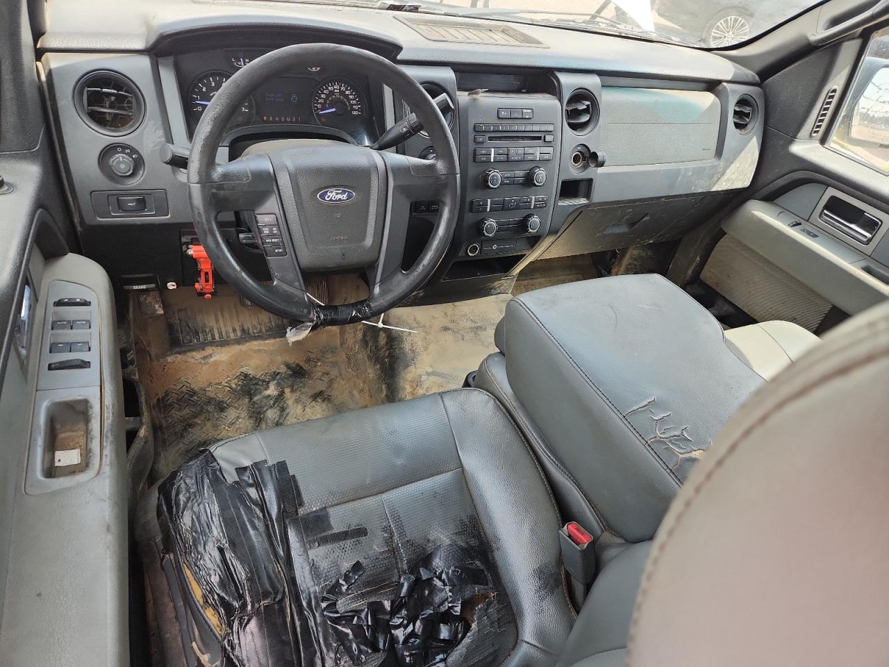 2011 Ford F150 Super Cab White vin: 1FTFX1EF7BFB42774 Damage: Front Center Armrest, Worn, Replacement Required