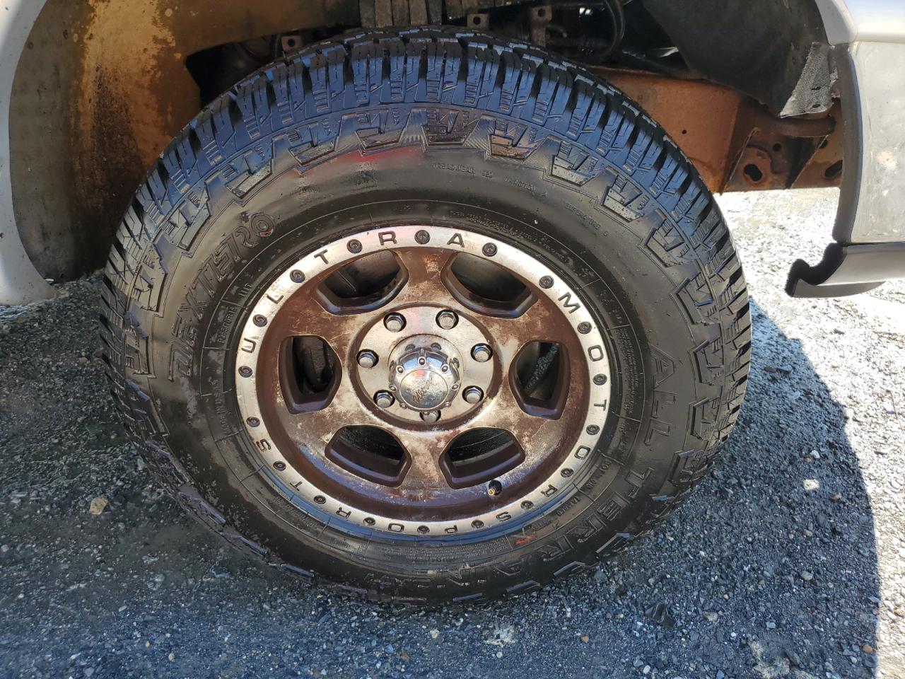 1997 Ford F250 Black vin: 1FTFX28L2VNB56258 Damage: Right Front Wheel, Rust, Repair Required
