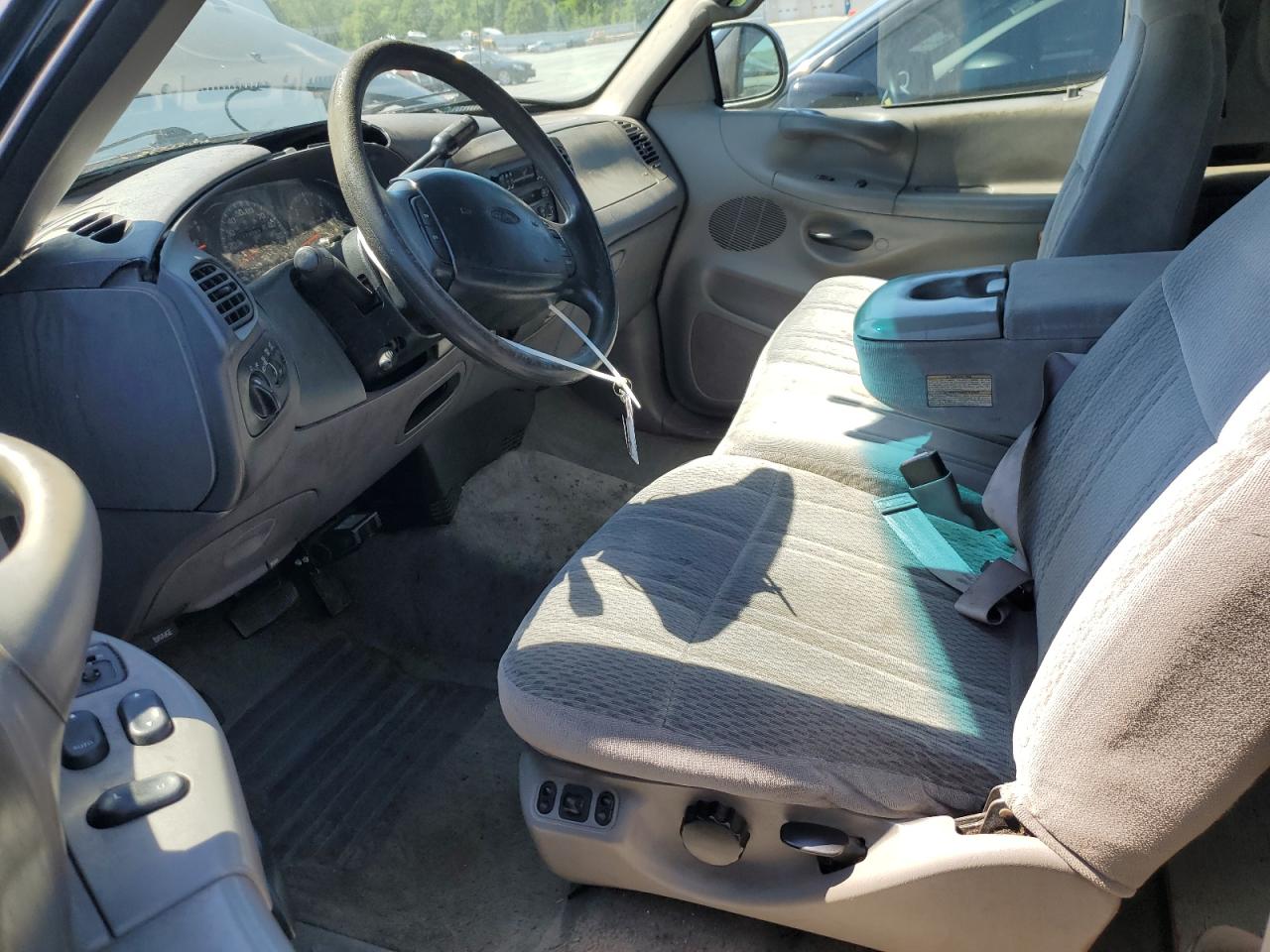 1997 Ford F250 Black vin: 1FTFX28L2VNB56258 Damage: Steering Wheel, Worn, Replacement Required