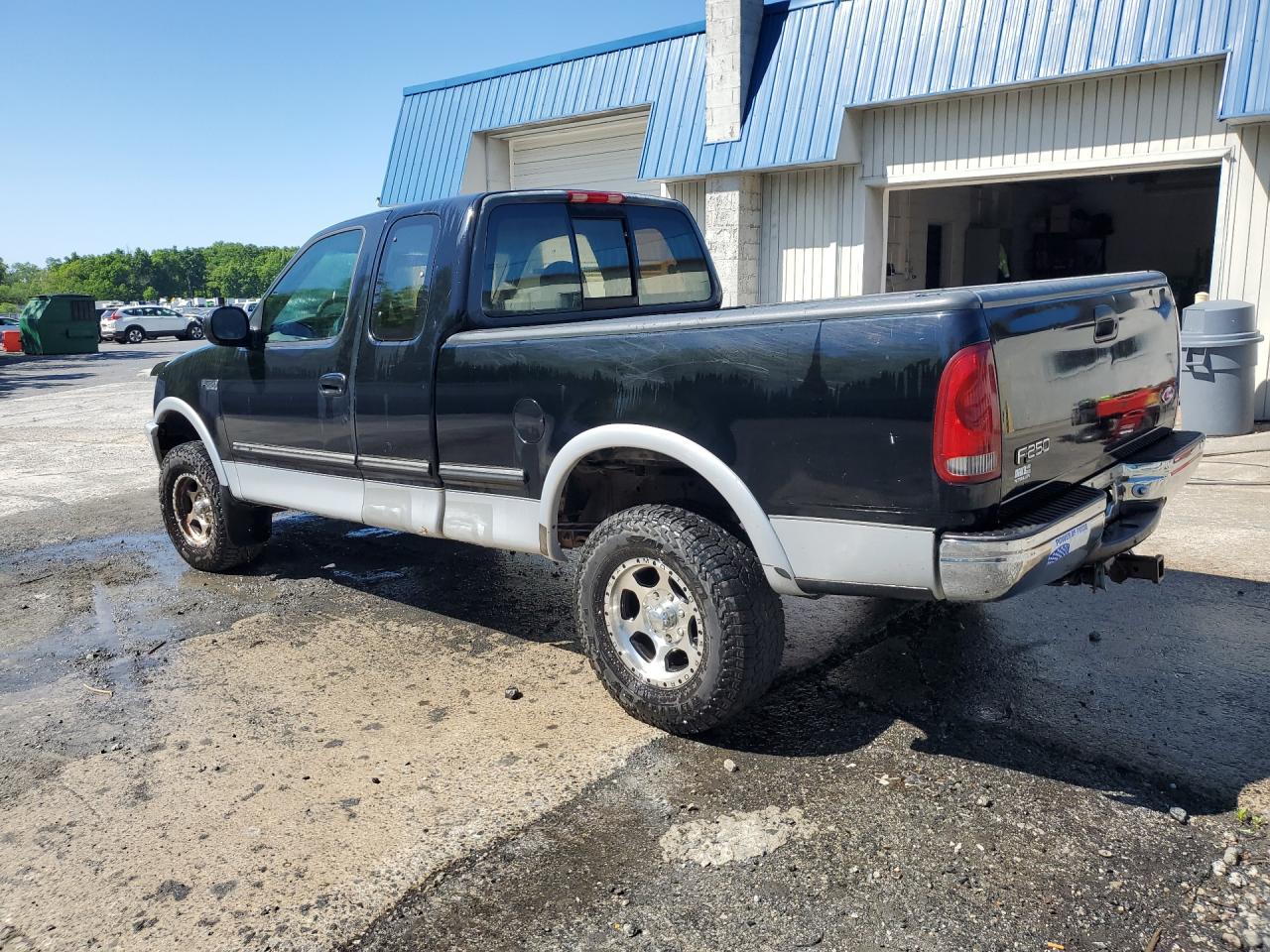 1997 Ford F250 Black vin: 1FTFX28L2VNB56258 Damage: Left Bed Side, Multiple Scratches Heavy, 10 Or More