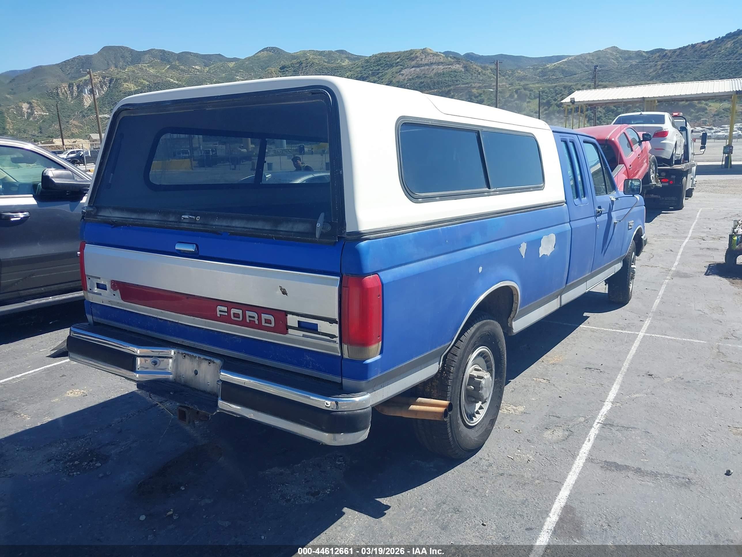 1987 Ford F250   Blue vin: 1FTHX25H3HKA11311