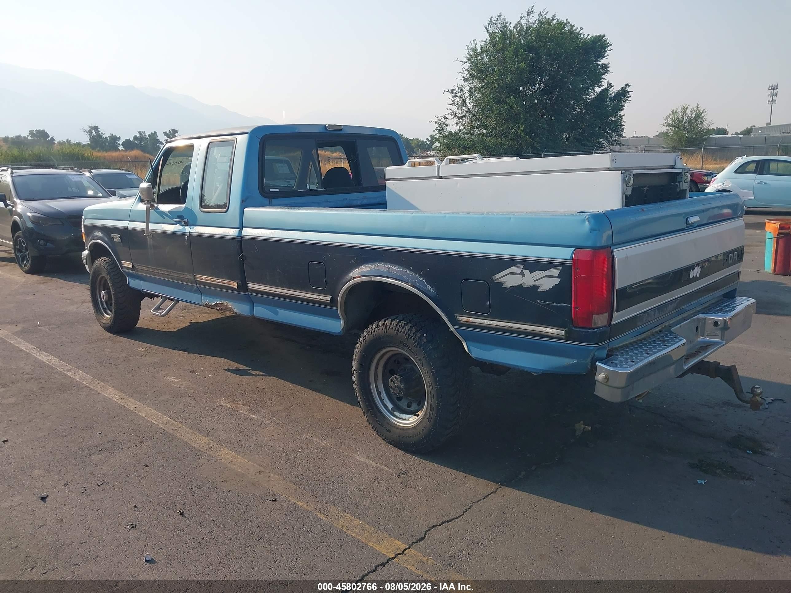 1993 Ford F250   Blue vin: 1FTHX26H3PKB66132