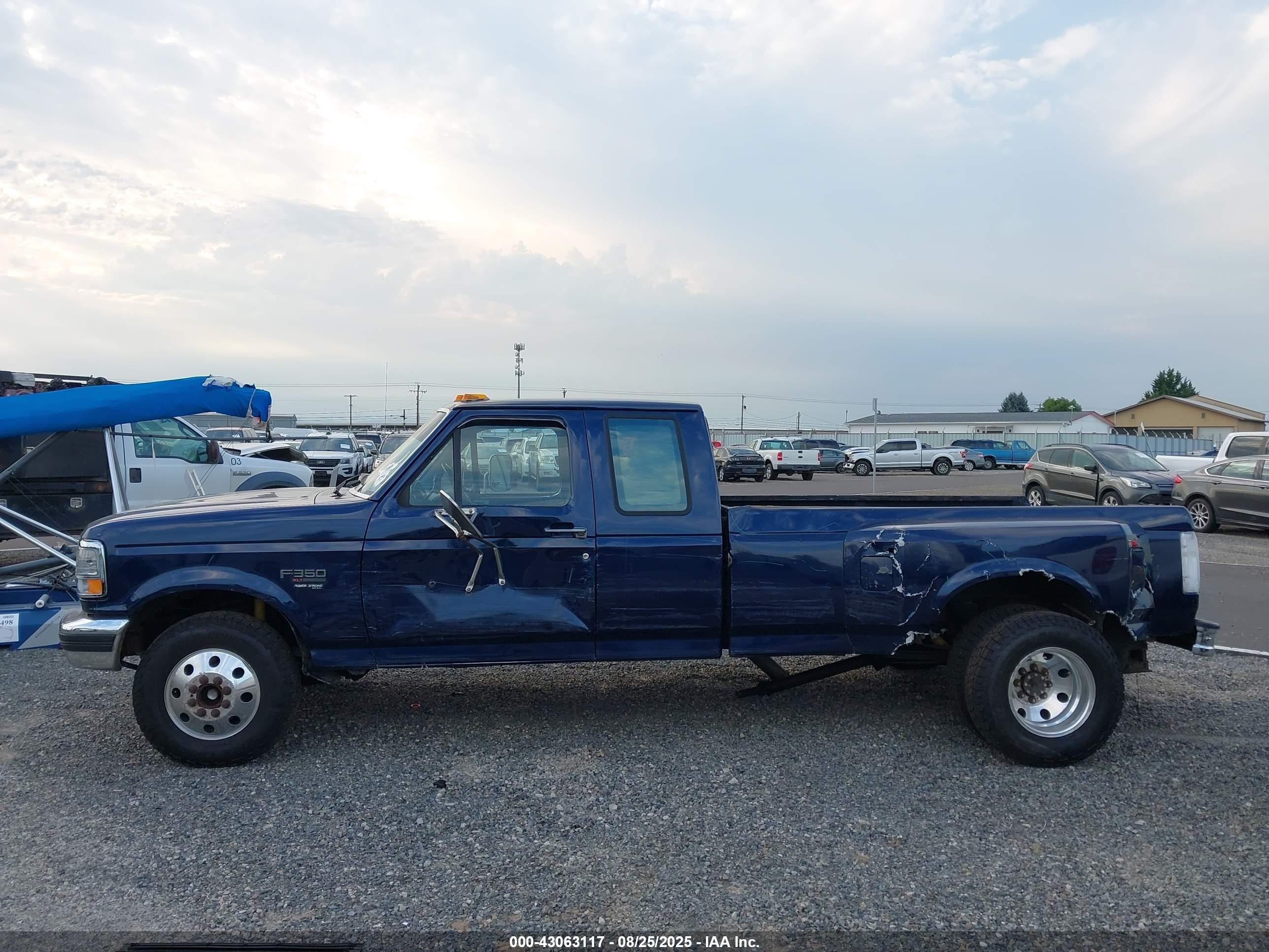 1995 Ford F350   Blue vin: 1FTJX35F8SKC26373