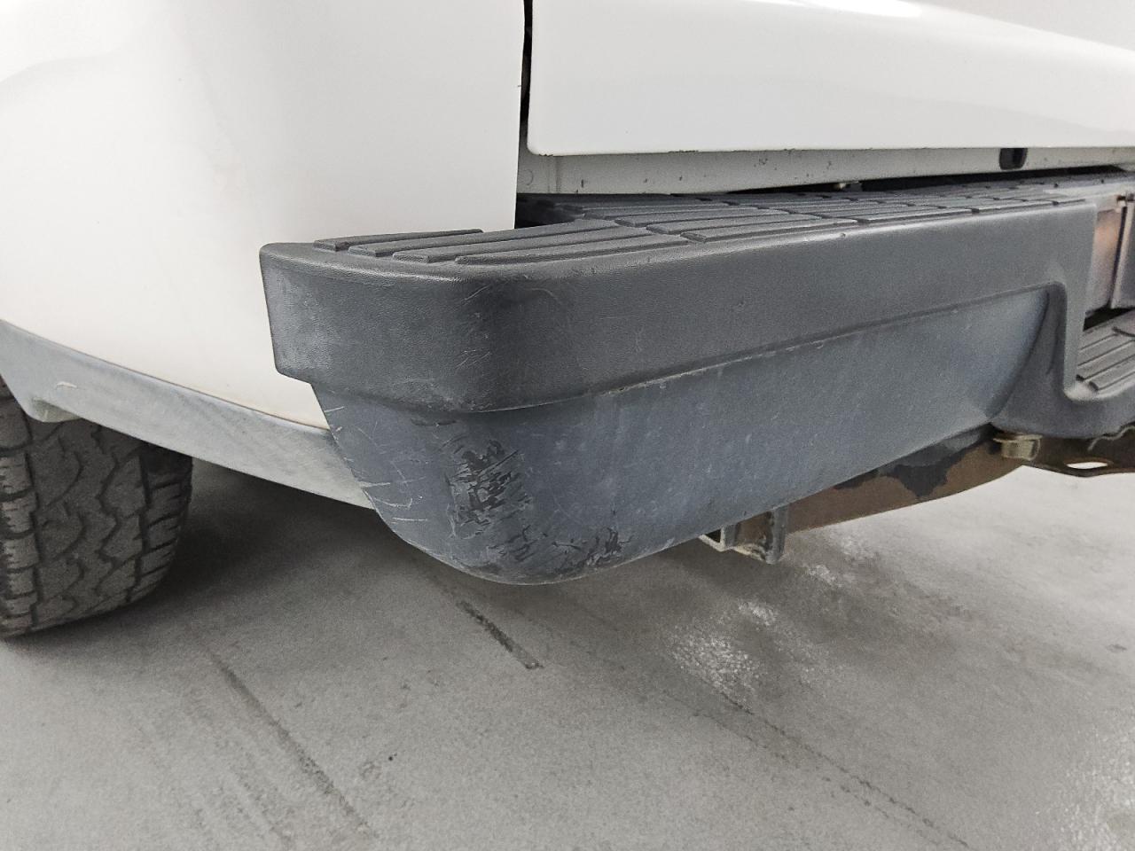 2010 Ford Ranger White vin: 1FTKR1AD0APA21946 Damage: Rear Metal Bumper Painted, Dent(S) W/ Paint Dmg, 3 To 4 Inches