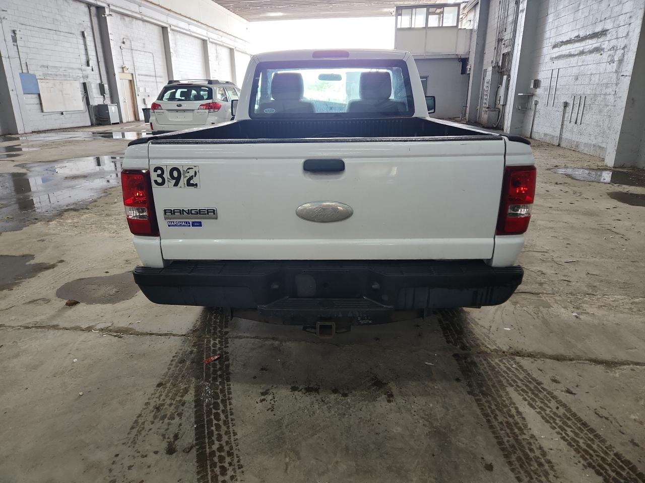 2011 Ford Ranger White vin: 1FTKR1AD0BPB02611 Damage: Tailgate, Multiple Scratches Heavy, 3
