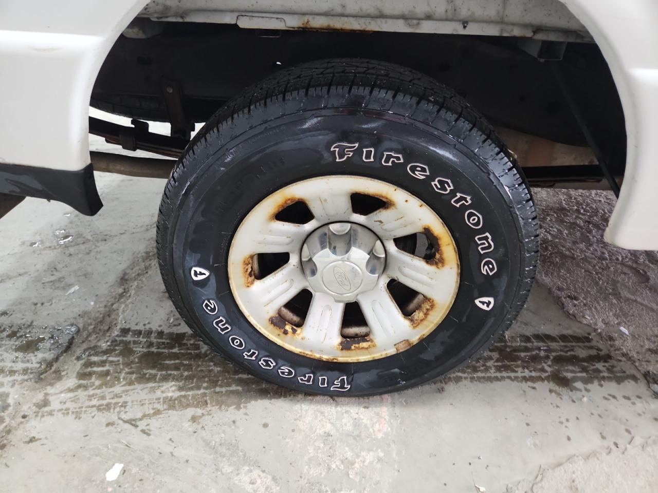 2011 Ford Ranger White vin: 1FTKR1AD0BPB02611 Damage: Right Rear Wheel, Corrosion, > 12 Inches