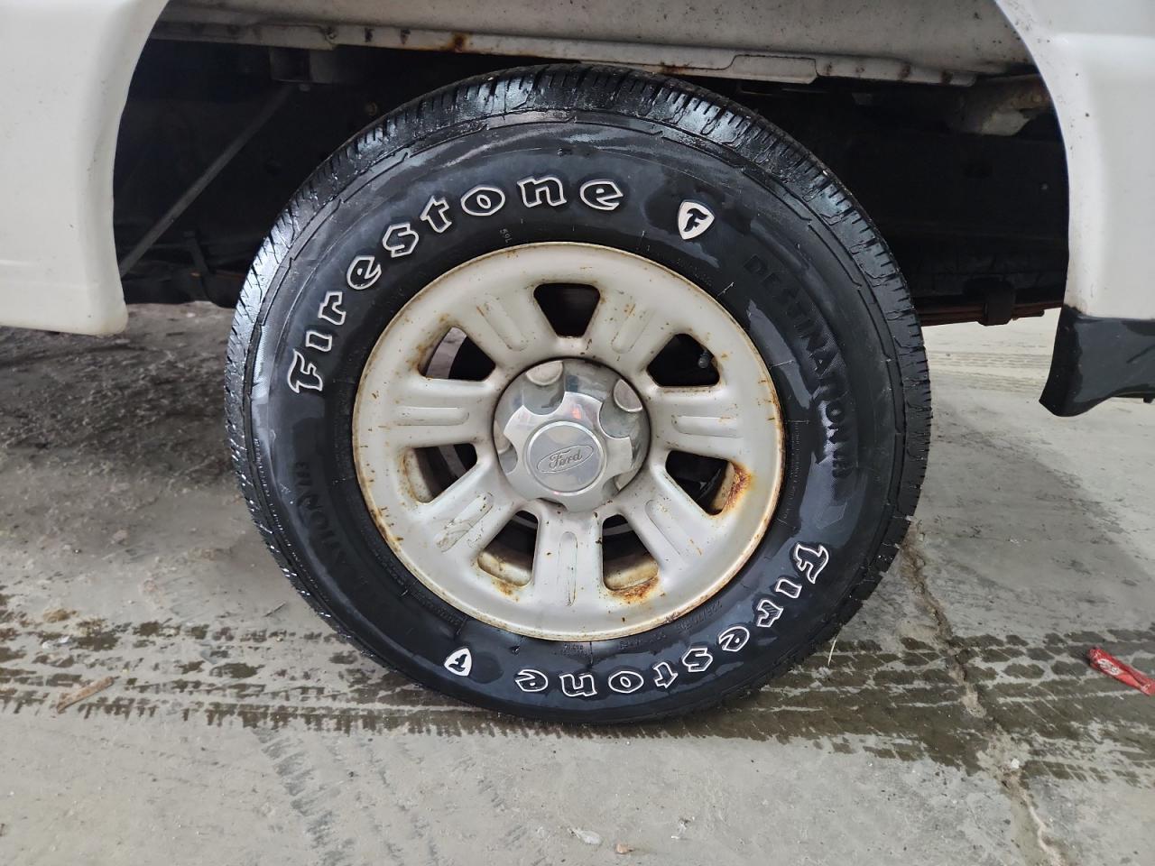2011 Ford Ranger White vin: 1FTKR1AD0BPB02611 Damage: Left Rear Wheel, Corrosion, > 12 Inches