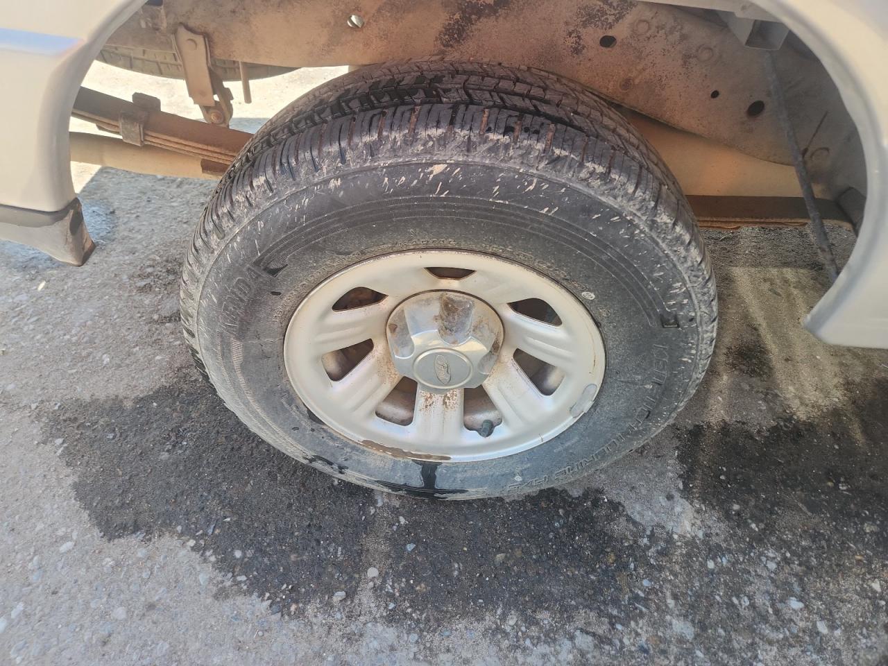 2010 Ford Ranger Silver vin: 1FTKR1AD4APA69059 Damage: Right Rear Wheel, Corrosion, > 12 Inches