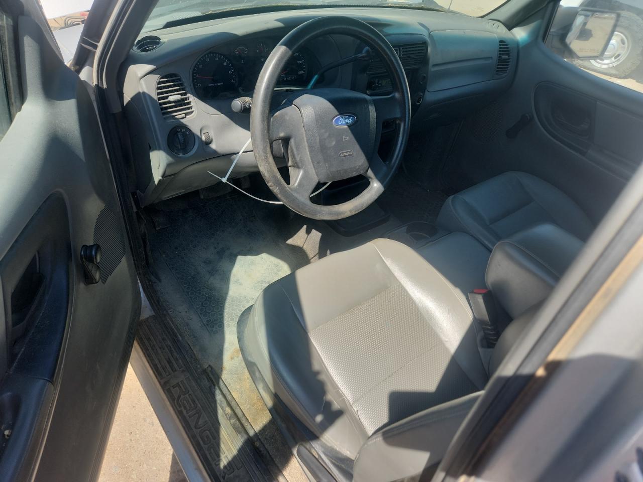 2010 Ford Ranger Silver vin: 1FTKR1AD4APA69059 Damage: Left Front Seat Cushion, Worn, Replacement Required