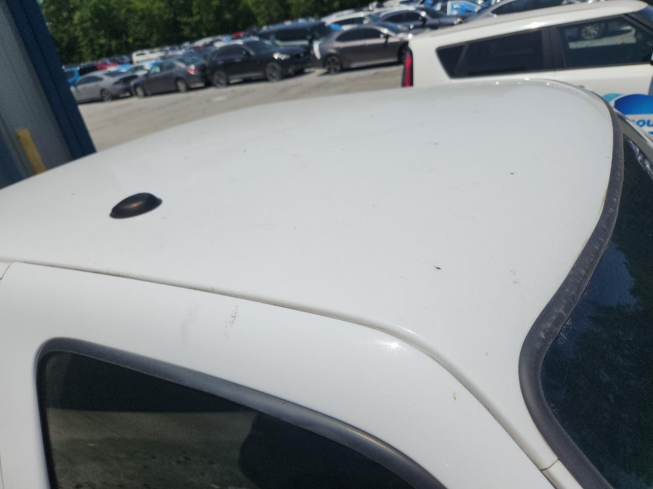 2011 Ford Ranger Super Cab White vin: 1FTKR1ED9BPA41544 Damage: Tailgate Protective Cap, Broken, Replacement Required