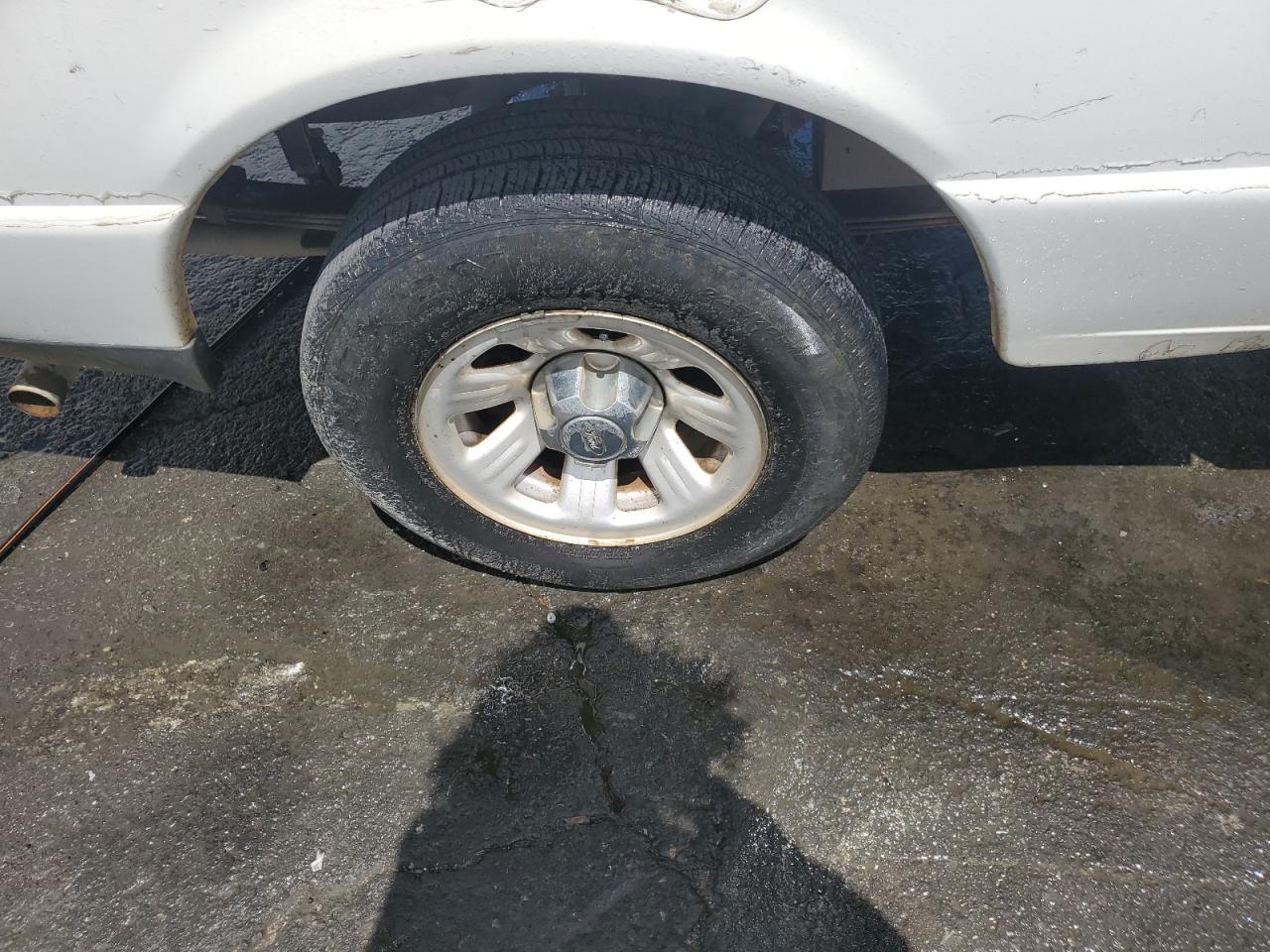 2011 Ford Ranger Super Cab White vin: 1FTKR1EDXBPA62239 Damage: Right Rear Wheel, Rust, Repair Required