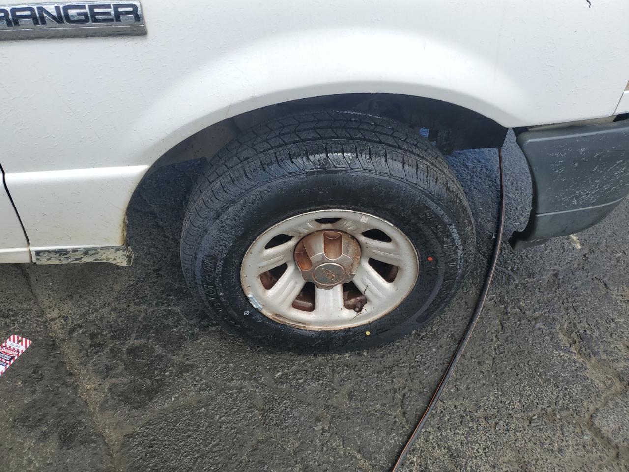 2011 Ford Ranger Super Cab White vin: 1FTKR1EDXBPA62239 Damage: Right Front Wheel, Rust, Repair Required