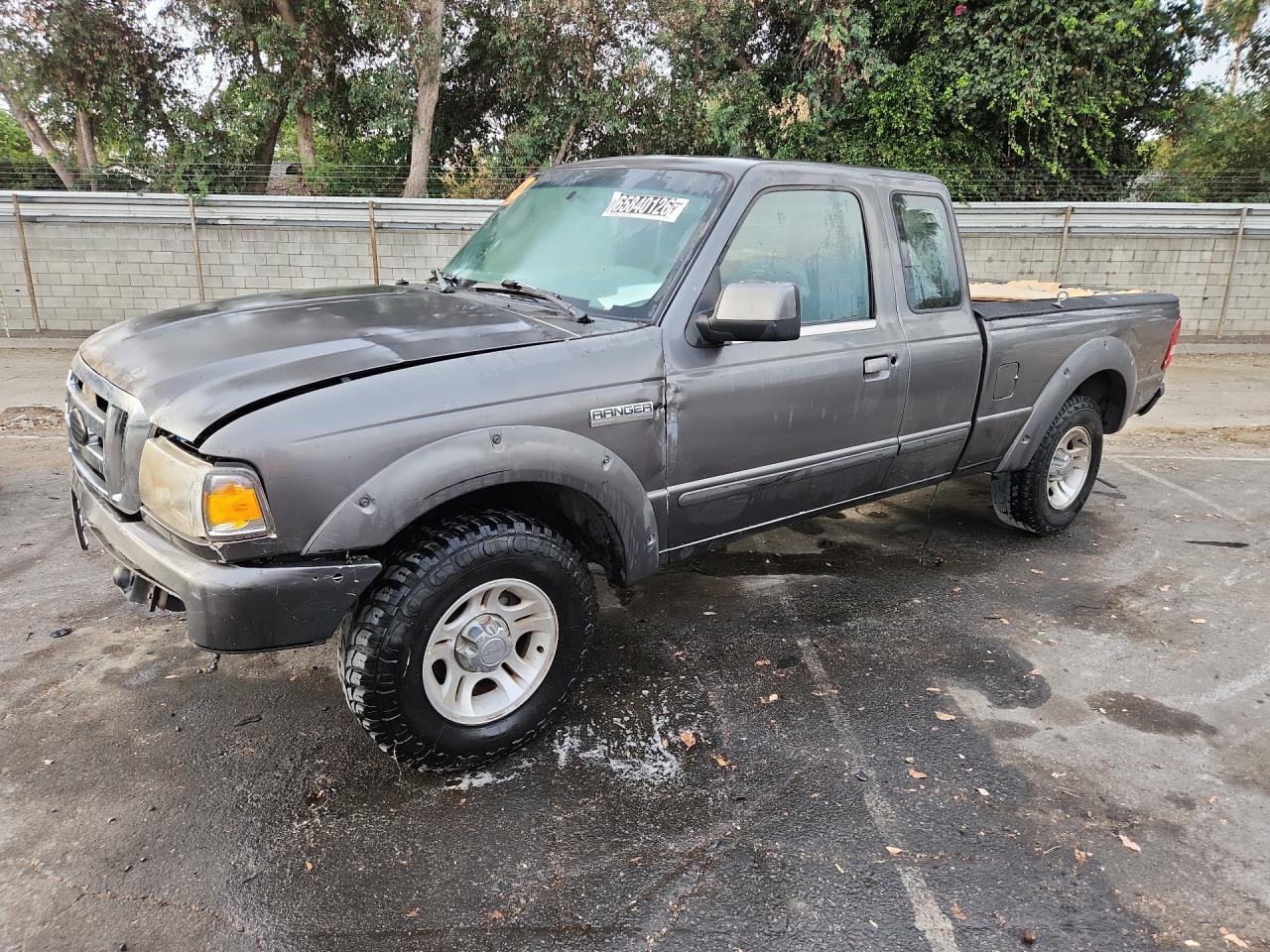 2011 Ford Ranger Super Cab Gray vin: 1FTKR1EE6BPA29554 Damage: Left Front Fender, Dent(S) W/ Paint Dmg, 6 To 7 Inches