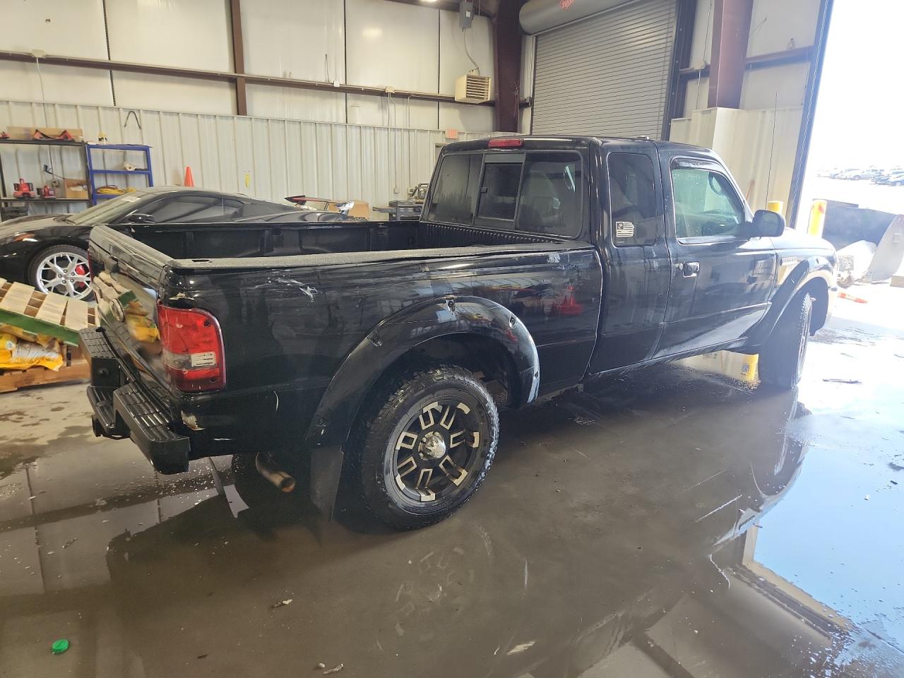 2011 Ford Ranger Super Cab Черный vin: 1FTLR4FE9BPA05950 Damage: Right Bed Side, Multiple Dents/Paint Damage, 2