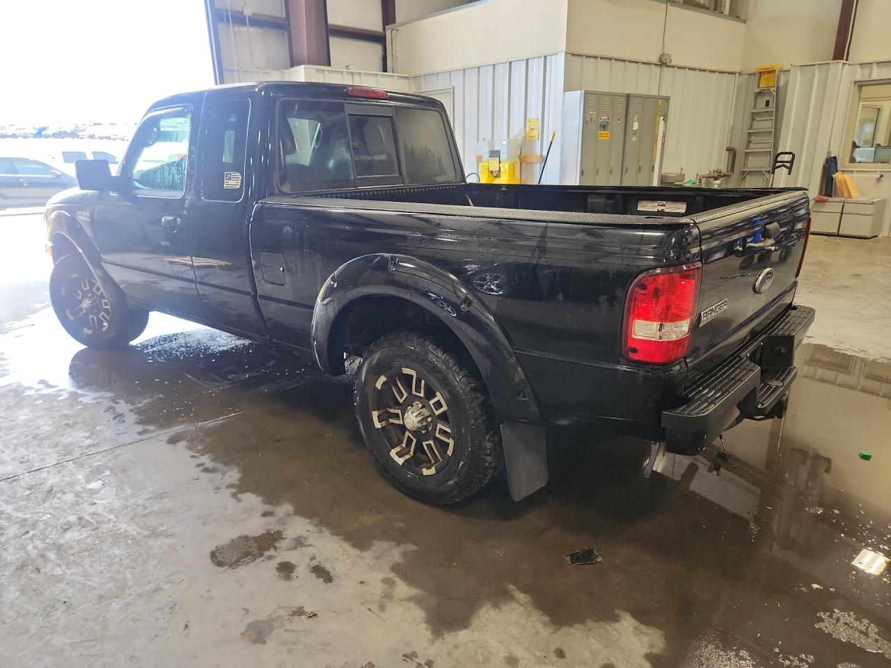2011 Ford Ranger Super Cab Черный vin: 1FTLR4FE9BPA05950 Damage: Left Qtr Flare, Multiple Scratches Heavy, 2
