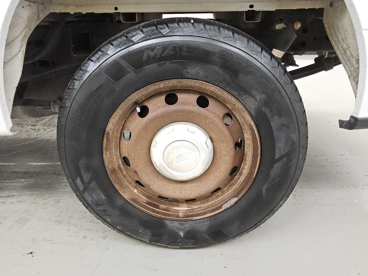 2015 Ford F150 White vin: 1FTMF1C85FKD17440 Damage: Left Rear Wheel, Rust, Repair Required