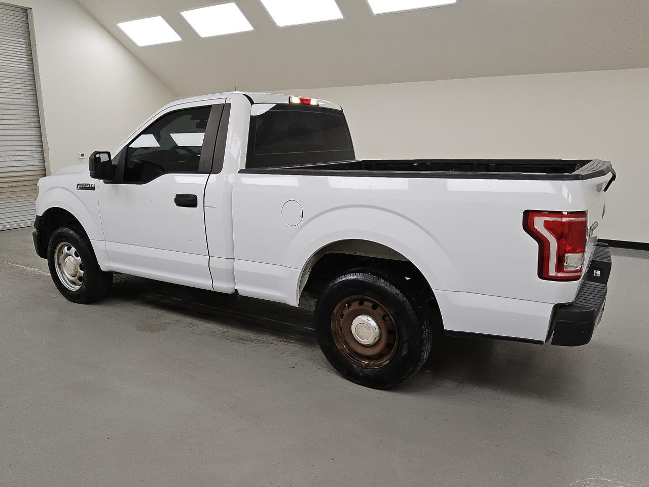 2015 Ford F150 White vin: 1FTMF1C85FKD17440 Damage: Cab - Left, Heavy Scratch, 2 To 3 Inches