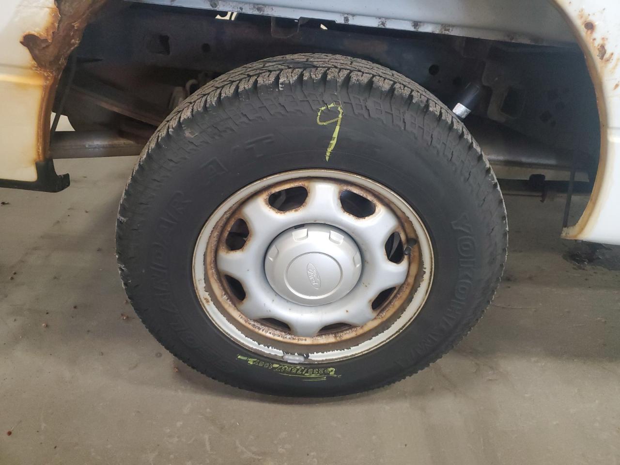 2014 Ford F150 White vin: 1FTMF1CM5EKF54442 Damage: Right Rear Wheel, Rust, Repair Required