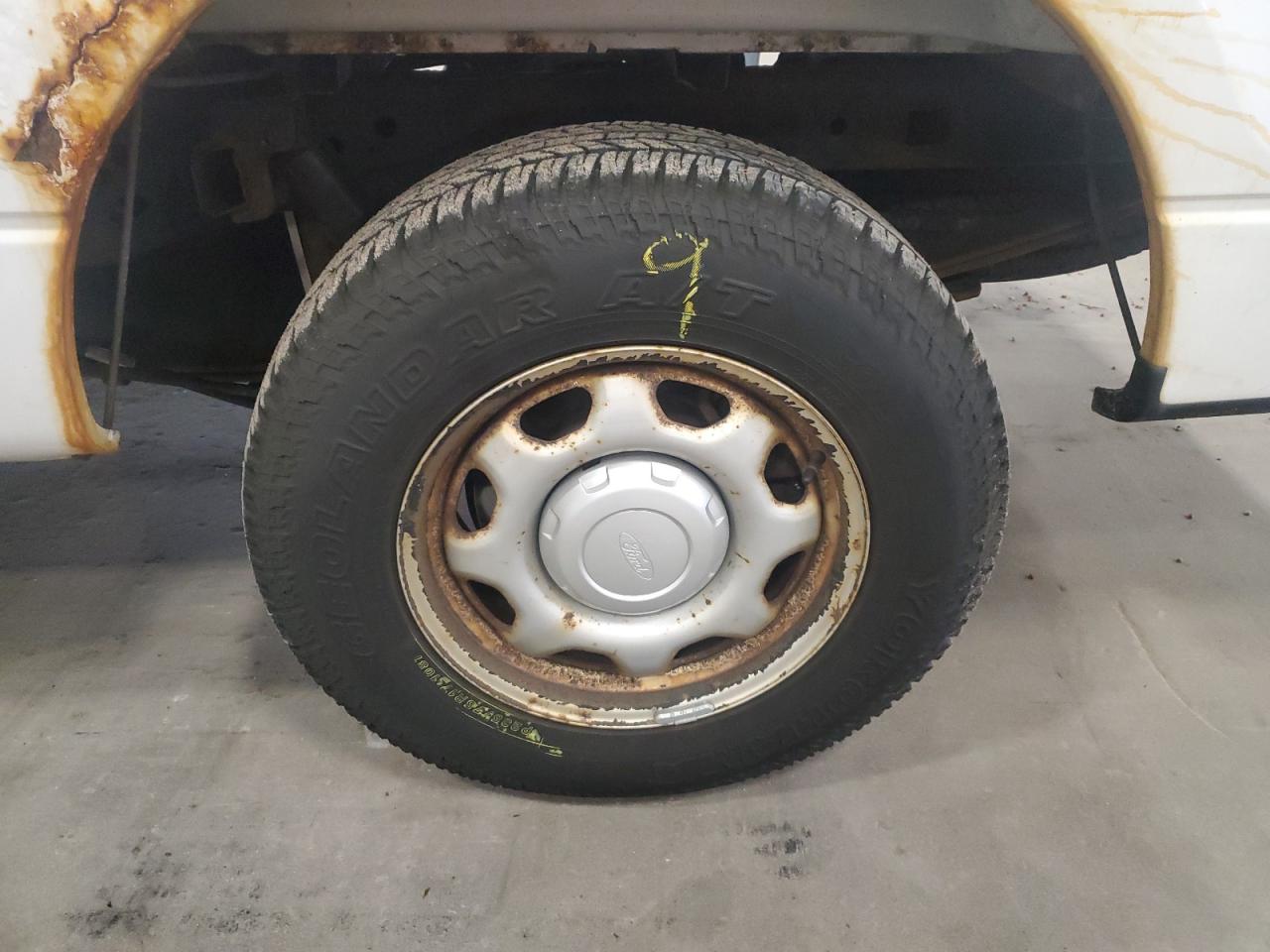 2014 Ford F150 White vin: 1FTMF1CM5EKF54442 Damage: Left Rear Wheel, Rust, Repair Required