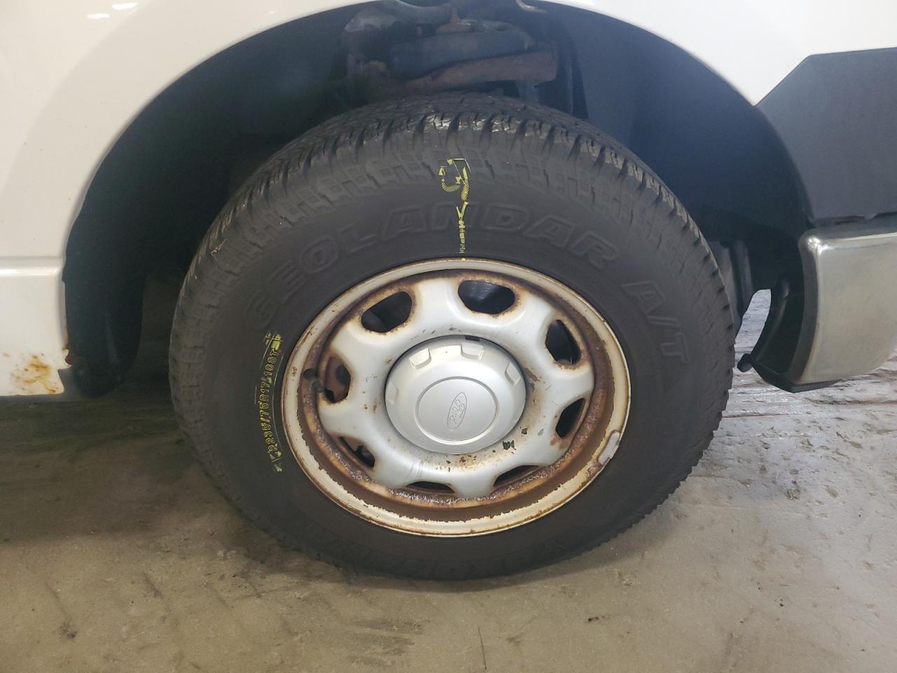 2014 Ford F150 White vin: 1FTMF1CM5EKF54442 Damage: Right Front Wheel, Rust, Repair Required
