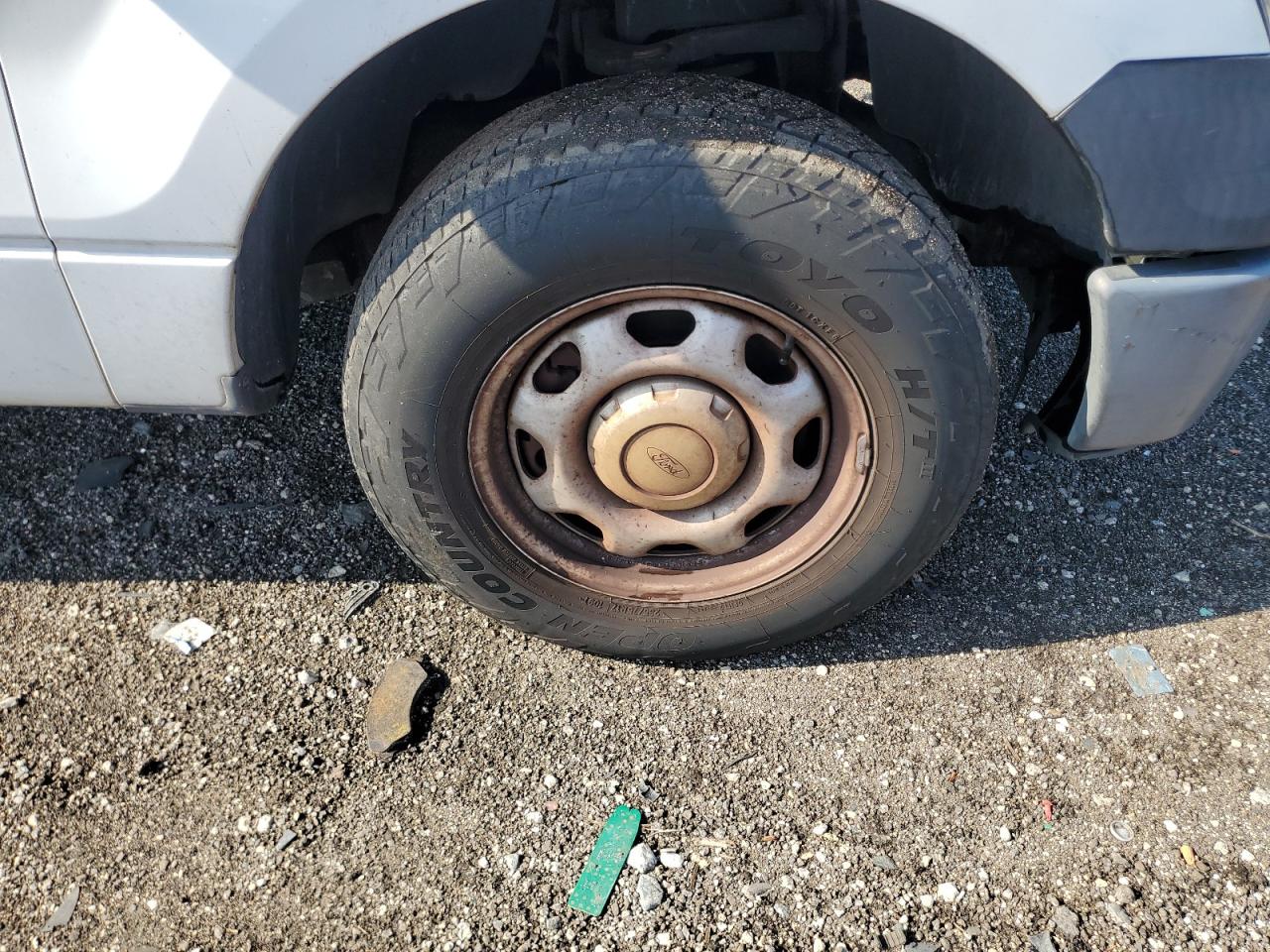 2014 Ford F150 White vin: 1FTMF1CM7EKG03074 Damage: Right Front Wheel, Rust, Repair Required