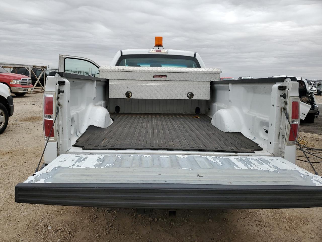 2010 Ford F150 White vin: 1FTMF1CW3AKB55329 Damage: Inside Bed, Peeling, > 12 Inches