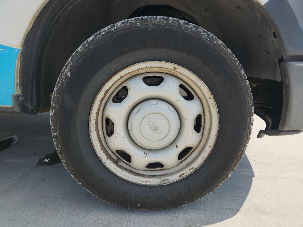 2010 Ford F150 White vin: 1FTMF1CW6AKB11079 Damage: Right Front Wheel, Peeling, > 12 Inches