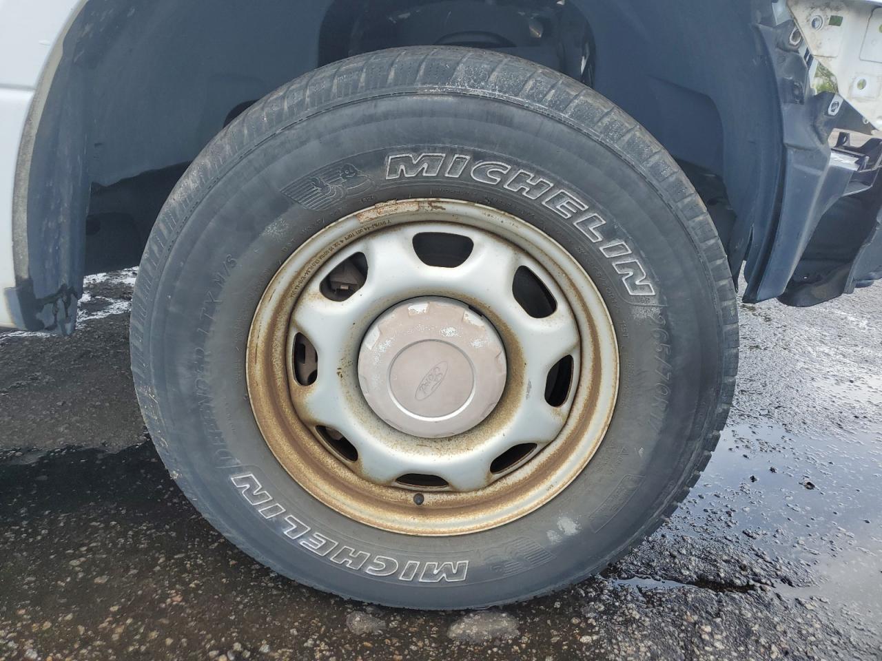 2015 Ford F150 White vin: 1FTMF1E84FFB08213 Damage: Right Front Wheel, Rust, Repair Required