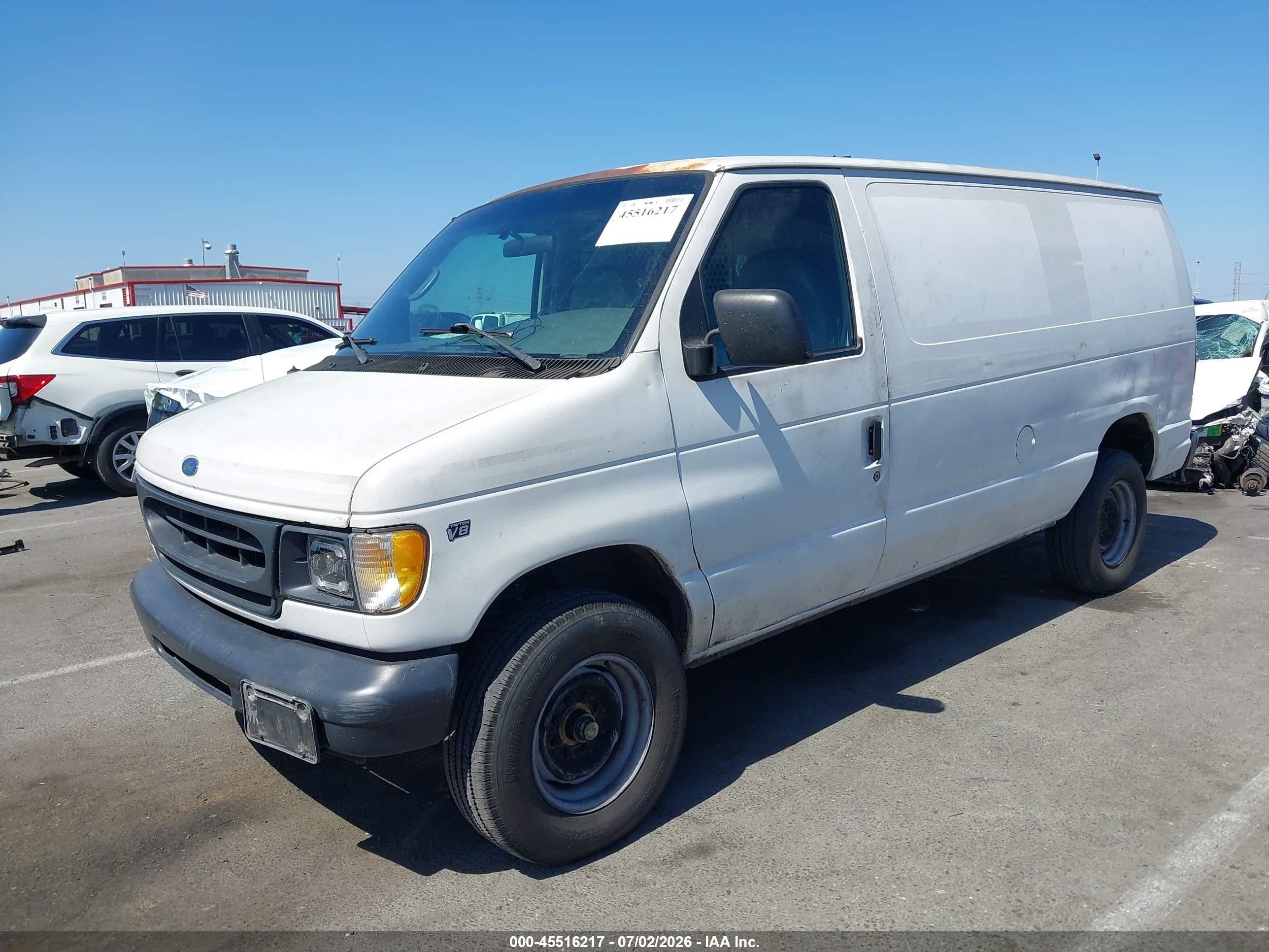 2001 Ford E-250   White vin: 1FTNE24L61HA29075