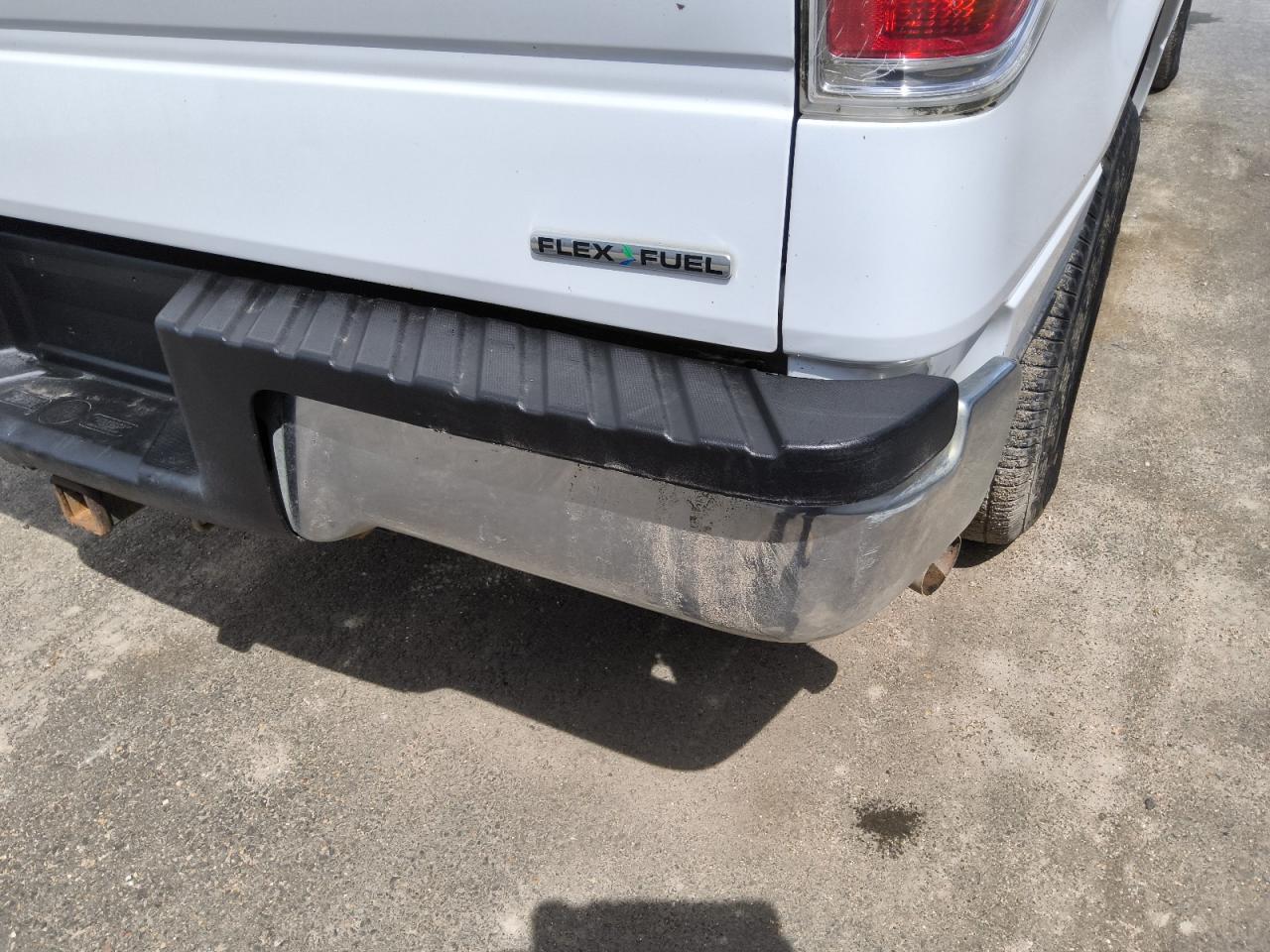 2014 Ford F150 White vin: 1FTNF1EF4EKG51084 Damage: Rear Metal Bumper Chrome, Dent(S) W/No Paint Dmg, > 12 Inches