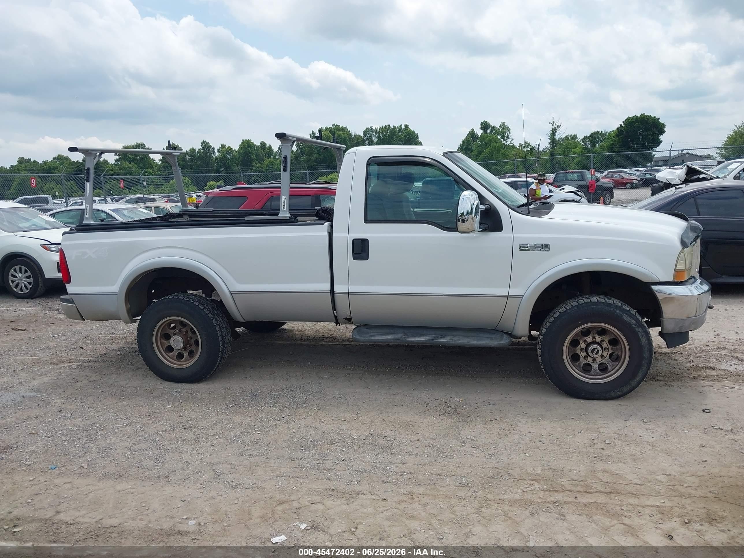 2001 Ford F-250   White vin: 1FTNF21L91EC06415