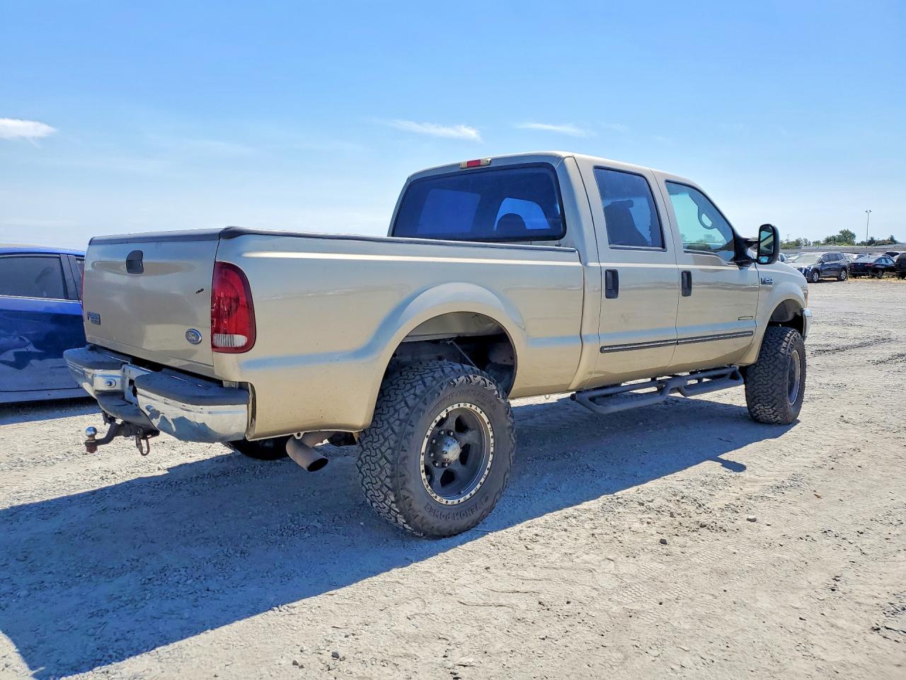 2000 Ford F250 Super Duty Gold vin: 1FTNW21F6YEB33010