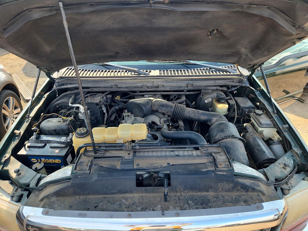 1999 Ford Lgt Convtnl Green vin: 1FTNX21S7XEC02635