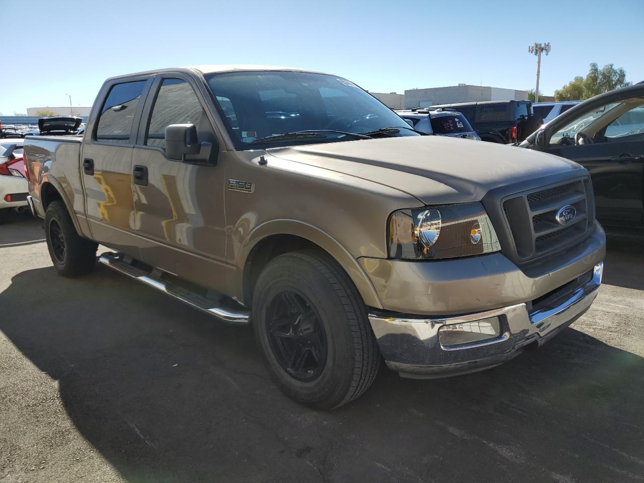 2005 Ford F150 Supercrew Tan vin: 1FTPW12505KB72309
