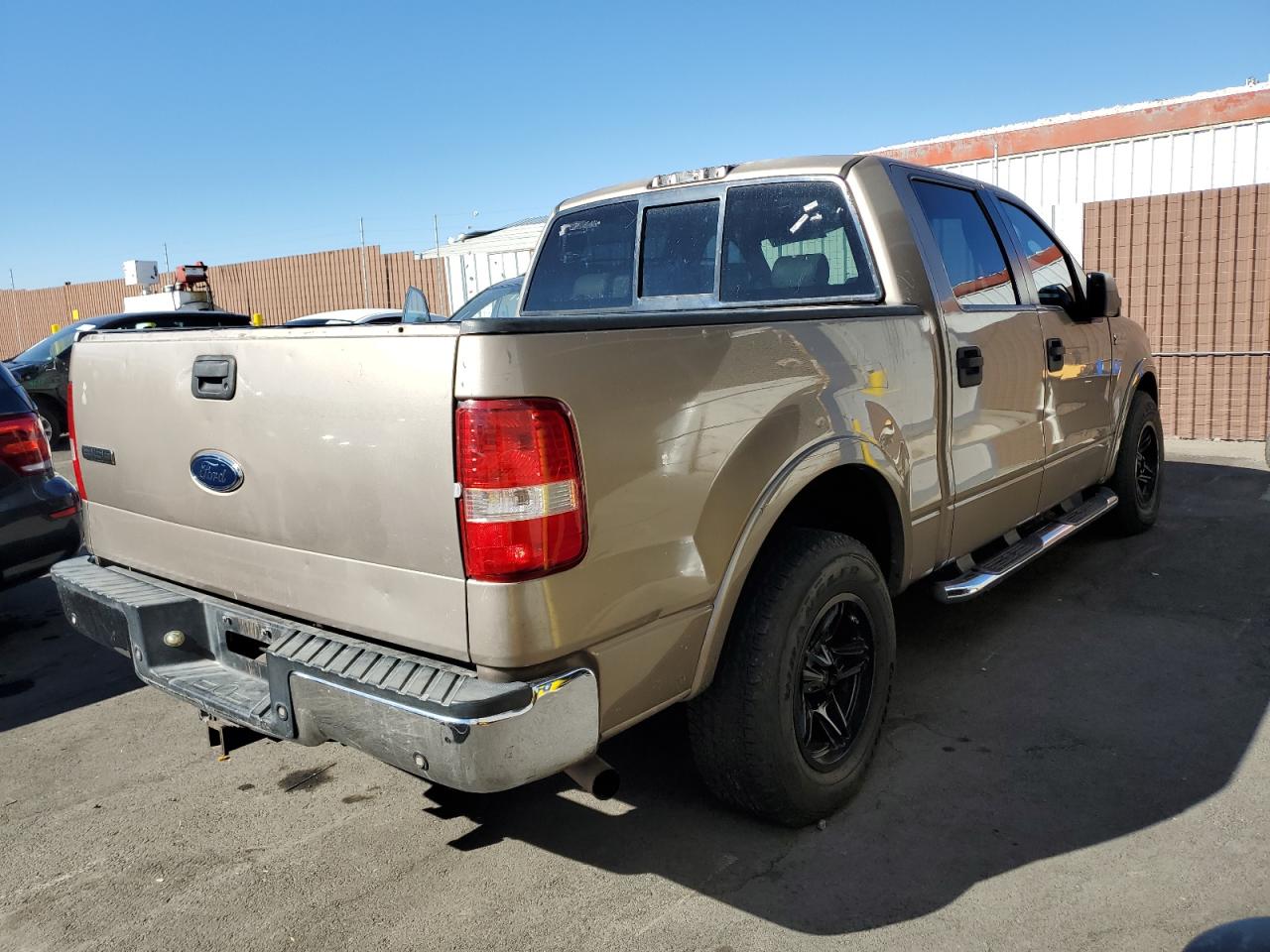 2005 Ford F150 Supercrew Tan vin: 1FTPW12505KB72309