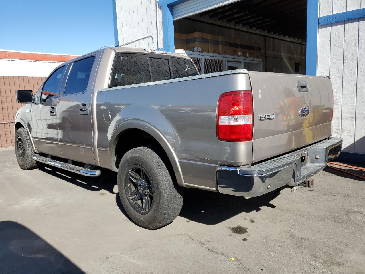 2005 Ford F150 Supercrew Tan vin: 1FTPW12505KB72309